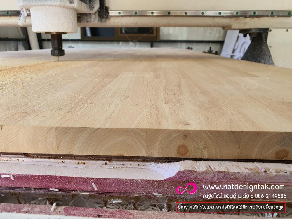 รับยิงเลเซอร์บนไม้