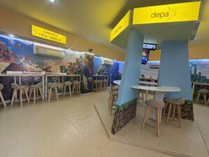 ป้ายไฟขอบอลูมิเนียมโปรไฟล์สีเหลืองในร้านเกม Depa CREATE NEW WORLD