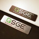 ป้ายแท็ก SGE แผ่นโรมาร์คสีเงินและสีดำ