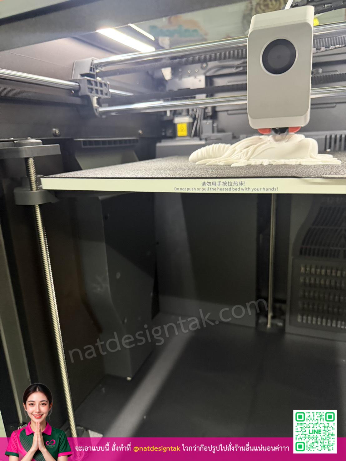 กระบวนการพิมพ์หน้ากาก 3D บนเตียงความร้อนของเครื่องพิมพ์สามมิติ